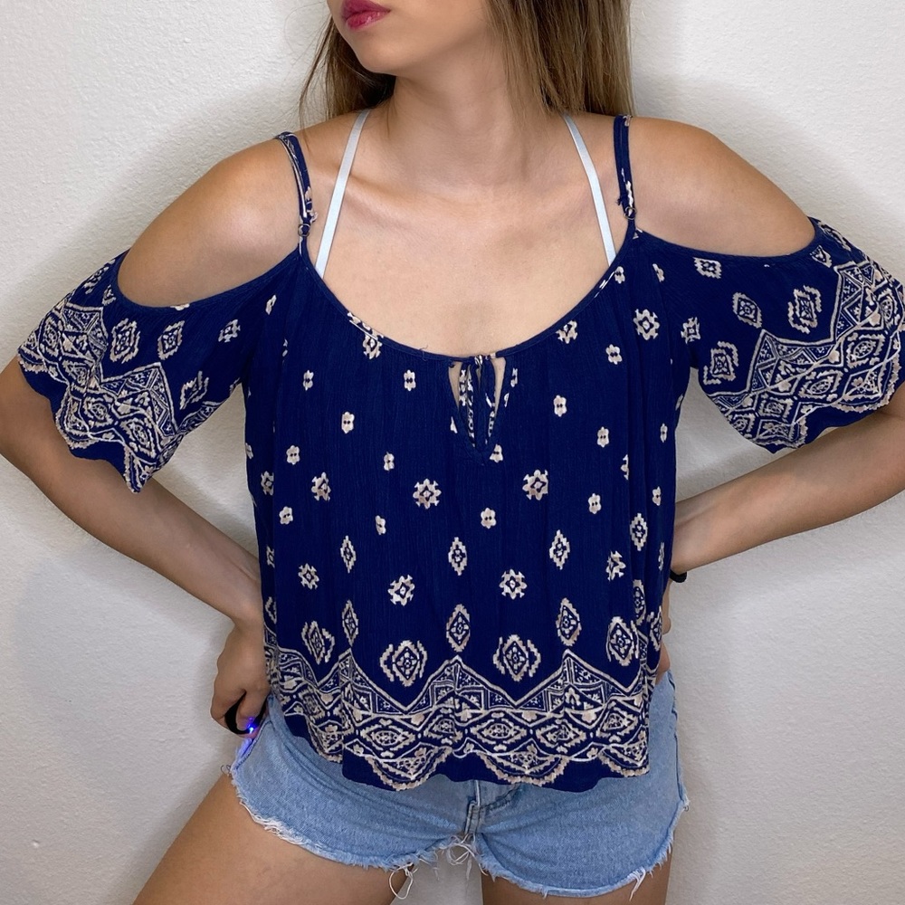 Over shoulder flap blouse